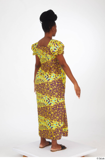 Dina Moses dressed standing whole body yellow long decora apparel…